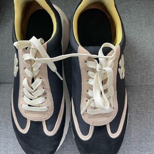 Tory Burch Good Luck Trainer, it has been worn a few times and washed once.